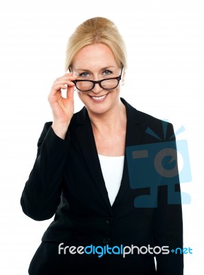 Female Secretary Taking A Closer Look At You Stock Photo