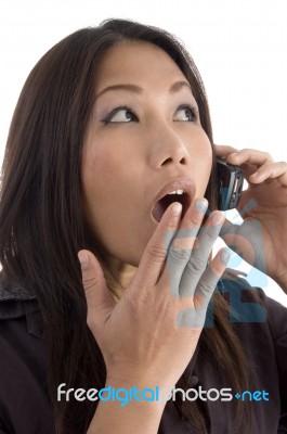 Female Shocked While Talking Stock Photo