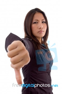 Female Showing Thumbs Down Sign Stock Photo