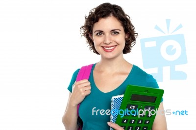 Female Student Holding Education Accessories Stock Photo