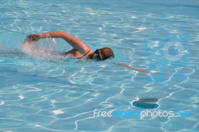 Female Swimming The Crawl 1 Stock Photo