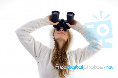 Female Watching Upward Through Binocular Stock Photo