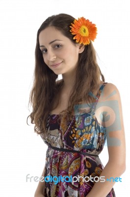 Female With Gerbera In Hair Stock Photo