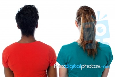 Females Facing Towards The Wall Stock Photo