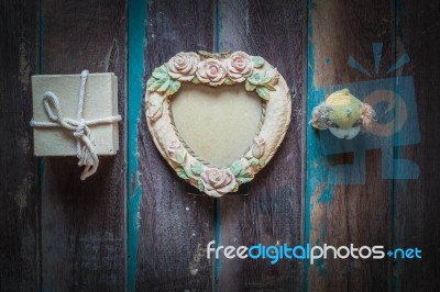 Festival Gift On A Wooden Floor Stock Photo