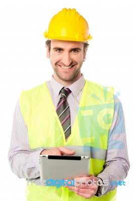 Field Worker Operating Touch Pad Device Stock Photo