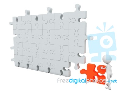 Figure with jigsaw Stock Image