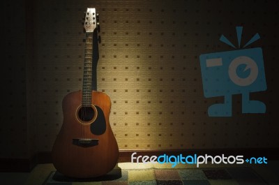 File Old Guitar Against Vintage Wall Stock Photo