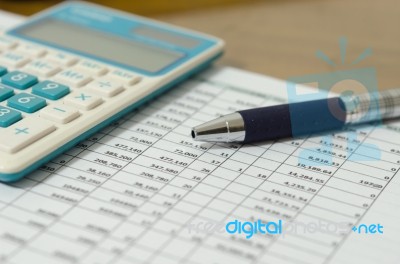 Financial Data Table And Calculator Stock Photo