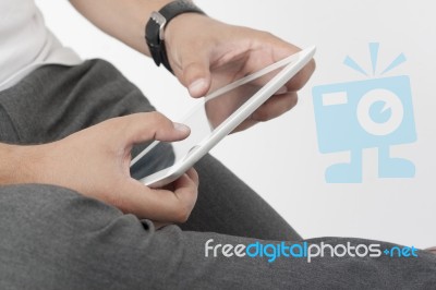 Finger Pointing On Digital Tablet Stock Photo