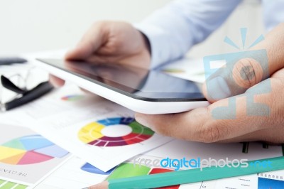 Finger Pointing On Digital Tablet Stock Photo