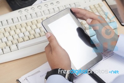 Finger Pointing On Digital Tablet Stock Photo