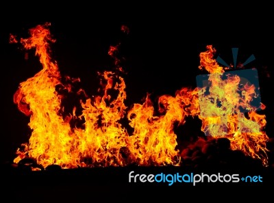 Fire Burning In Black Background Stock Photo