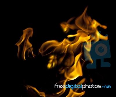 Fire Flaming On Black Stock Photo