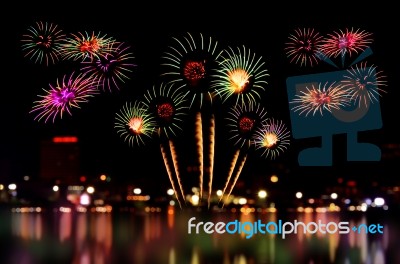 Fireworks Celebration And The City Night Light Background Stock Photo