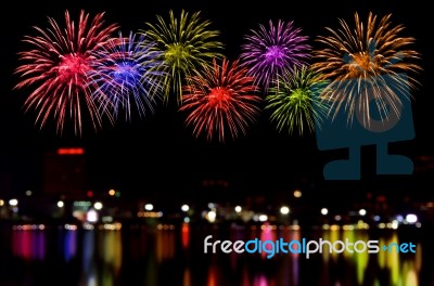 Fireworks Celebration And The City Night Light Background Stock Photo