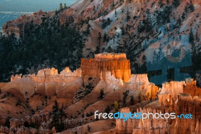 First Rays Of The Sun Striking Bryce Canyon Stock Photo