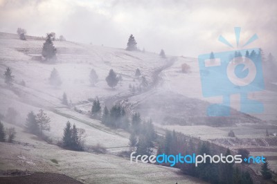 First Snow On The Mountain Hills Stock Photo