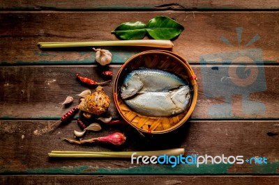 Fish And Spices On A Wood Stock Photo