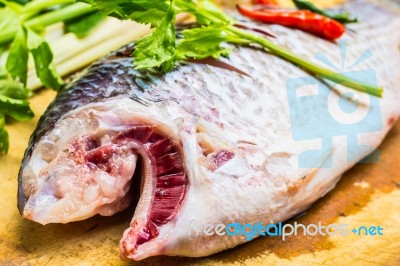 Fish And Spices To Prepare Food Stock Photo