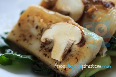 Fish Sauce And Fresh Mushrooms Stock Photo