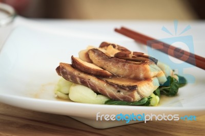 Fish Sauce And Fresh Mushrooms Stock Photo