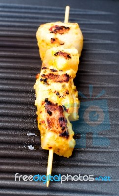 Fish Spear Grilling On Barbecue Stock Photo