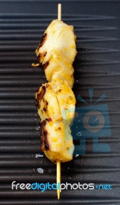 Fish Spear Grilling On Barbecue Stock Photo