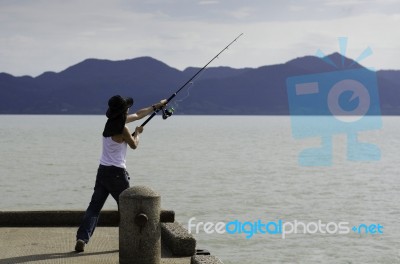 Fisherman Fishing Trolling In The Sea Stock Photo