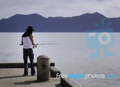 Fisherman Fishing Trolling In The Sea Stock Photo