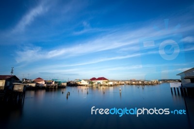 Fisherman Village At Sea Shore In Beach Sunset Stock Photo