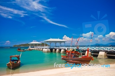 Fishing Boat And Wood Waterfront Pavilion Stock Photo