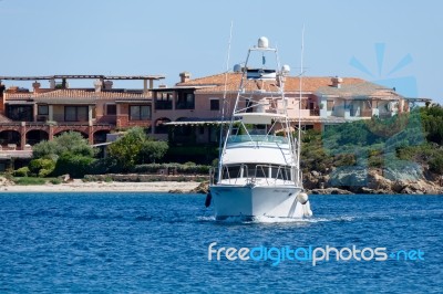 Fishing Boat Coming Into Porto Cervo Stock Photo