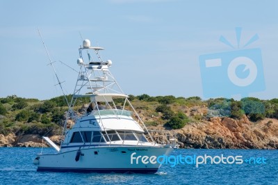 Fishing Boat Coming Into Porto Cervo Stock Photo