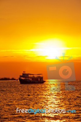 Fishing Boat Heading Out To The Sea Stock Photo