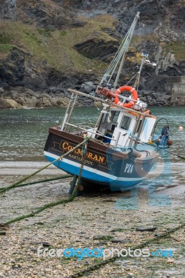 Fishing Boat In Port Isaac Cornwall Stock Photo