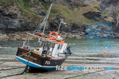 Fishing Boat In Port Isaac Cornwall Stock Photo