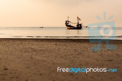 Fishing Boat Is Floating On The Sea Stock Photo