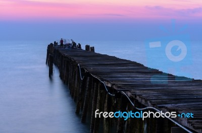 Fishing Pier At Sunrise Stock Photo