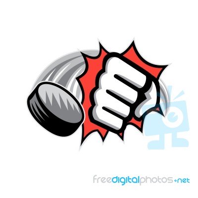 Fist Breaking Wall Hockey Puck Stock Image