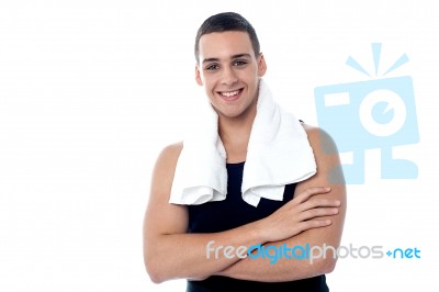 Fit Athlete Posing With Arms Crossed Stock Photo