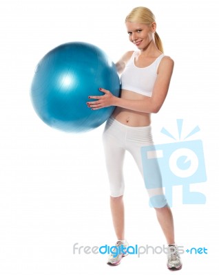 Fit Female Athlete With Gym Ball Stock Photo