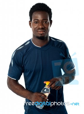 Fit Man Posing With Water Bottle Stock Photo