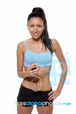 Fit Woman On With  Earphones Stock Photo