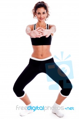 Fitness Girl Stretching Her Hands Stock Photo