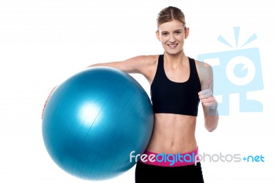 Fitness Girl With Aerobic Ball  Showing Thumbs Sign Stock Photo