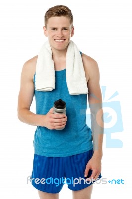 Fitness Guy Holding Sipper Bottle Stock Photo