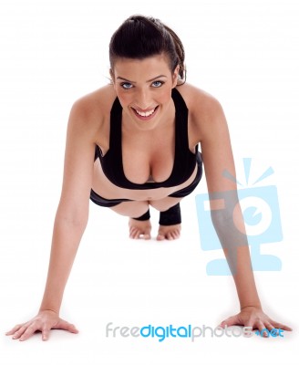 Fitness Lady Performs Pushups On The Floor Stock Photo