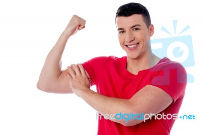 Fitness Man Showing Bicep Muscles Stock Photo