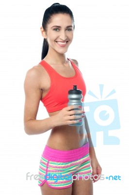 Fitness Woman Holding Sipper Bottle Stock Photo